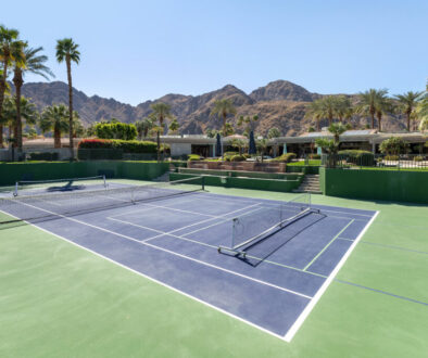 Outdoor pickleball court at a multi-use facility, showcasing effective pickleball court management in a scenic setting