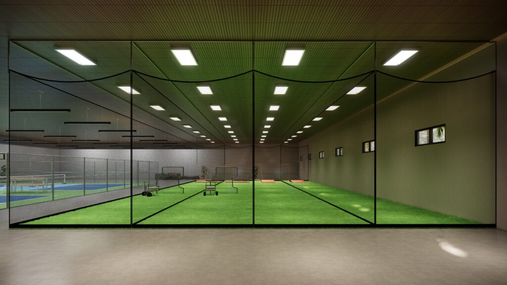 Modern multi-sport indoor facility with turf fields and hard courts for baseball, softball, and tennis training.