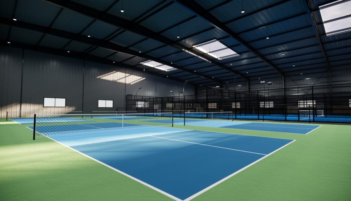 An indoor tennis facility with multiple courts, highlighting a well-planned club layout and design, an essential component of a comprehensive tennis club business plan